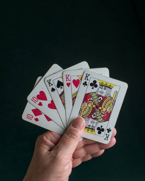 Baccarat table with visible scoreboard and side-bet options on shuffle